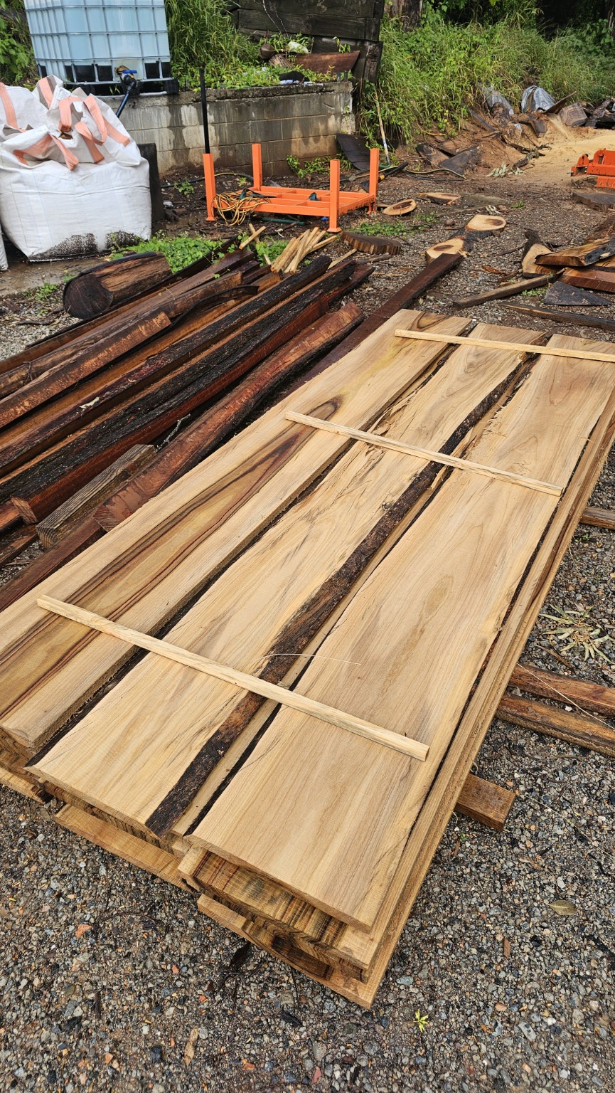 Timber slabs showing natural grain and edges